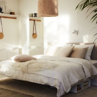 IKEA bedroom with white comforter
