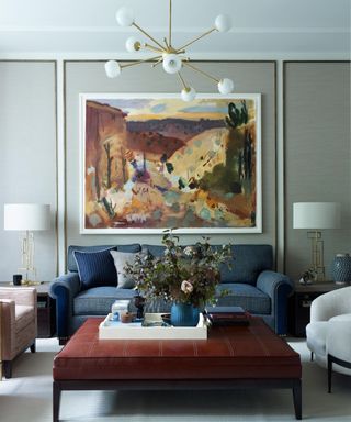 Living room with large art within wall panels