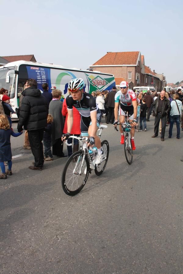 The riders had to pass through throngs of fans to get to the line.