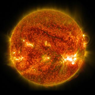 The sun unleashed an X2-class solar flare on Oct. 26, 2014. NASA's Solar Dynamics Observatory captured this photo of the flare (lower right).