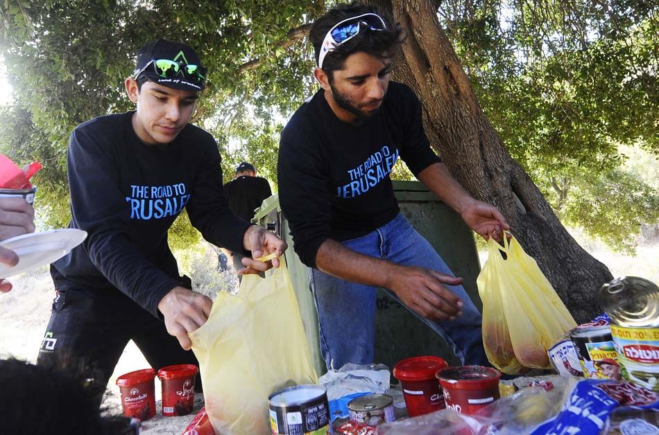 Luis Lemus and Aviv Yechezkel tuck into lunch
