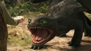 Toothless baring his teeth at Hiccup in the How To Train Your Dragon Live Action Movie.