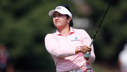 Lilia Vu plays a fairway wood shot