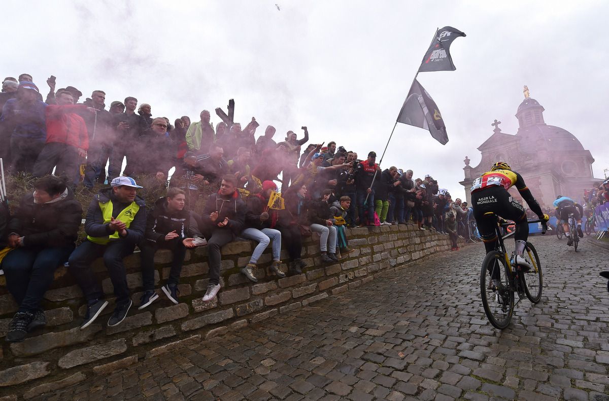 Oliver Naesen (AG2R La Mondiale) rides through the flares