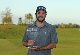 Mark Hubbard holding a trophy