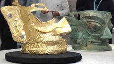 A broken gold mask unearthed from a sacrificial pit at the Sanxingdui Ruins site, shown here on March 20, 2021, in Guanghan, Sichuan Province of China.