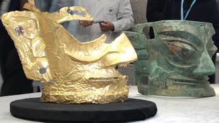 A broken gold mask unearthed from a sacrificial pit at the Sanxingdui Ruins site, shown here on March 20, 2021, in Guanghan, Sichuan Province of China.