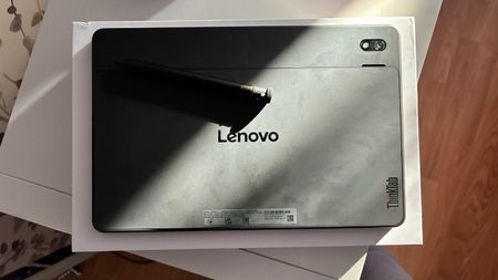 The Lenovo Think Tab X11 on a worktop