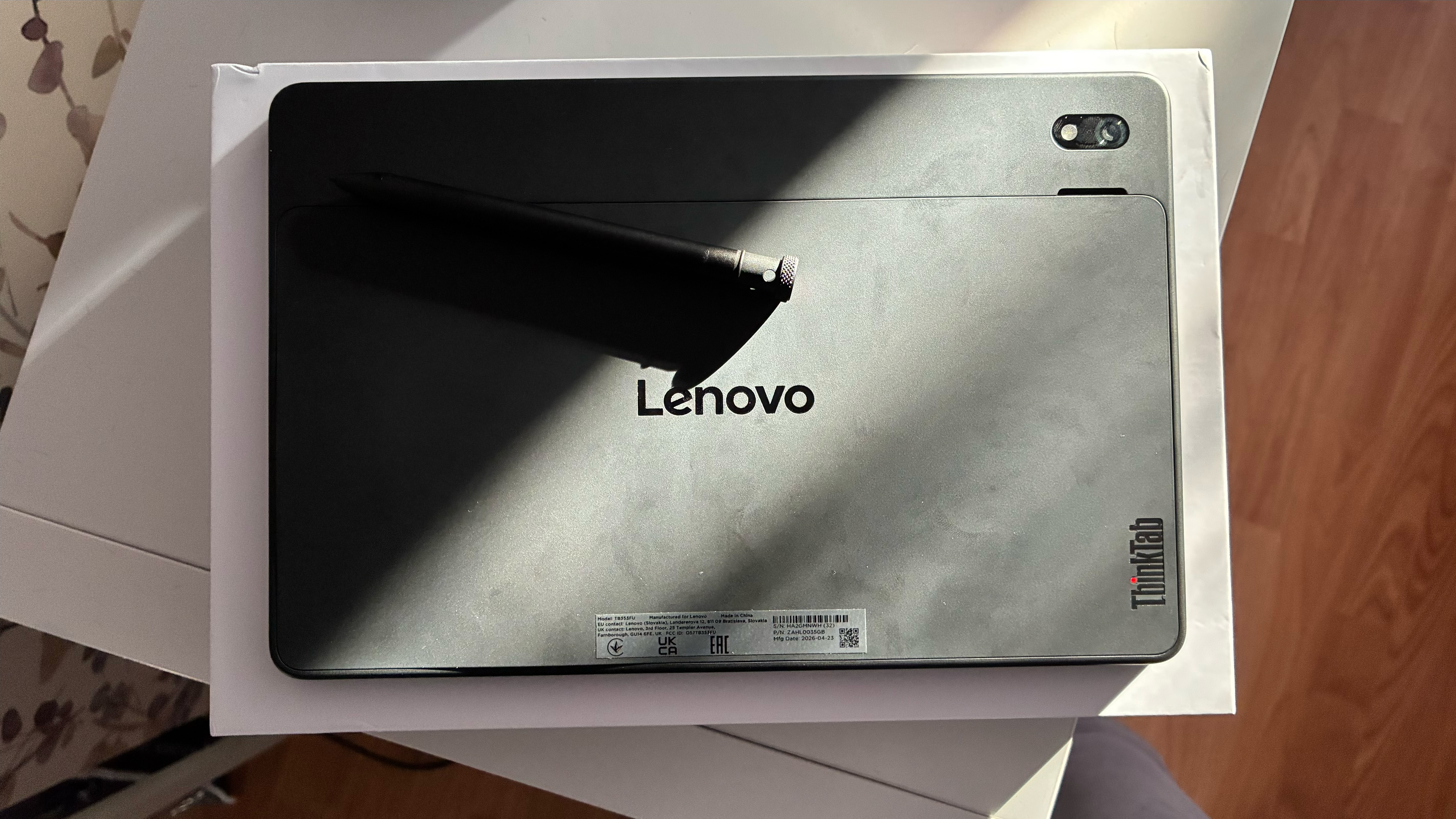 The Lenovo Think Tab X11 on a worktop 