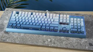 A Redragon Blue Siren K654 wired mechanical keyboard with multi-tone blue keycaps