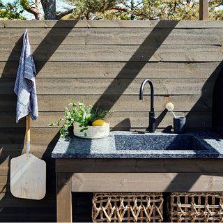 outdoor kitchen with tap and sink area