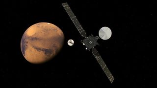 An artist's concept shows the ExoMars orbiter and lander approaching the Red Planet.