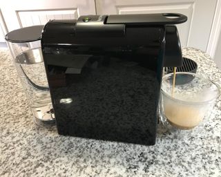 Making a lungo coffee using the Nespresso Essenza mini coffee maker