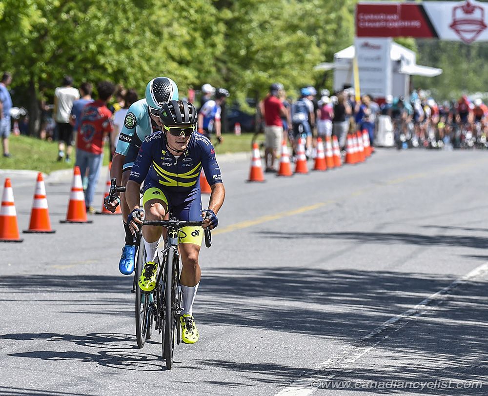Evan Burtnik (X-Speed United) and Robin Plamondon (Floyd's Pro Cycling) attack and go clear