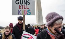 People participate in a rally on the National Mall for stricter gun-control laws on Jan. 26.