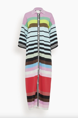 a striped christopher john rogers dress in front of a plain backdrop