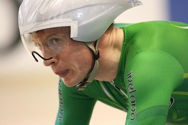 David O'Loughlin (Ireland) watches the clock count down ahead of his qualifying ride in the men's 4,000m individual pursuit