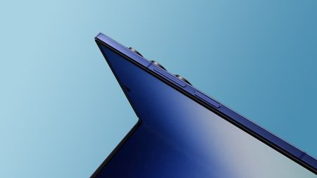 Leaked render of the Samsung Galaxy Z Fold 7 mid-fold against a gradient blue background.