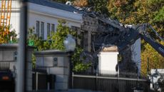 Demolition equipment tears down facade of White House East Wing for President Donald Trump's ballroom