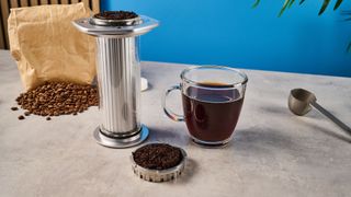 a glass AeroPress premium with aluminum flourishes 