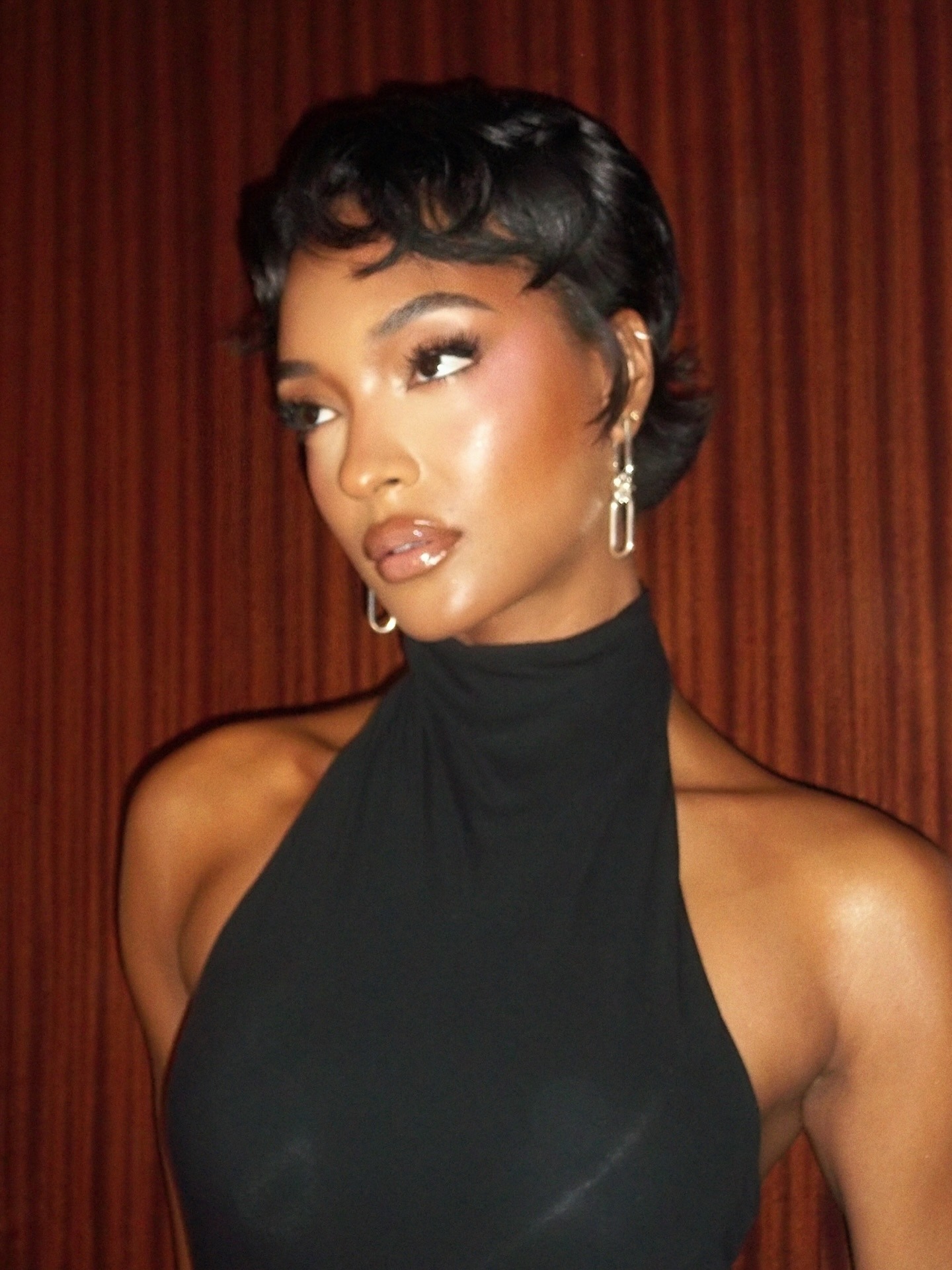 Jourdan Dunn with a wavy pixie hairstyle and soft fringe