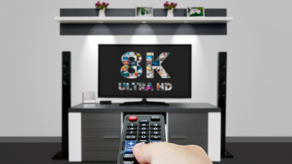 he best 8K TVs: Image depicts 8K TV with hand and remote 