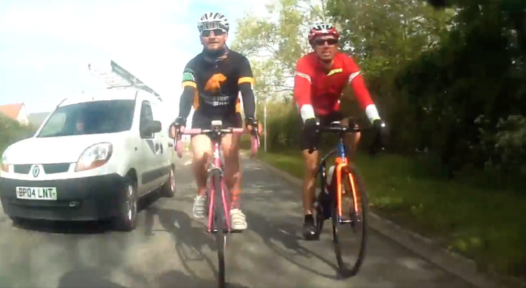 White van driver performs close pass on cyclists
