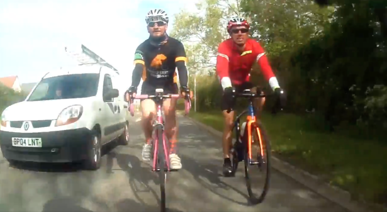 White van driver performs close pass on cyclists
