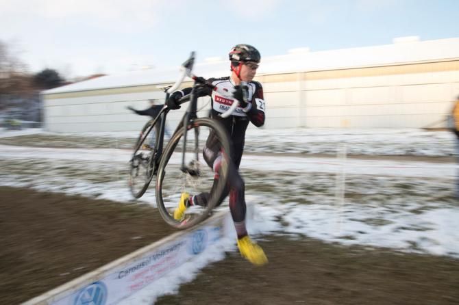 Newcomer Michael Van Den Ham flies over the barrier