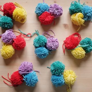 yarn pompoms in rainbow colours