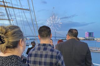 Attendees watch fireworks
