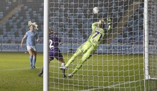 Sam Mewis heads home Manchester City's third goal