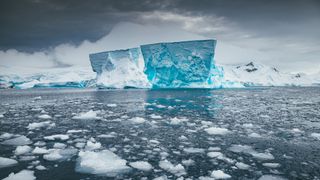 Massive blue iceberg in Antarctica.