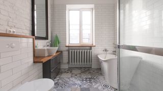 White bathroom with floor tiles
