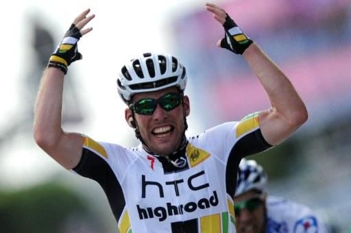 Mark Cavendish (HTC Highroad) raises his arms in celebration of another Tour de France stage win.
