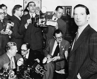 Kim Philby (1912 - 1988), former First Secretary to the British Embassy in Washington, holds a press conference at his mother's home in Drayton Gardens, London, on Nov. 8, 1955.