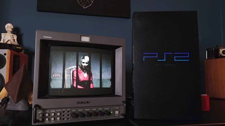 Original PS2 console on right and Sony PVM CRT TV on right with Silent Hill 2 intro featuring Maria on screen.