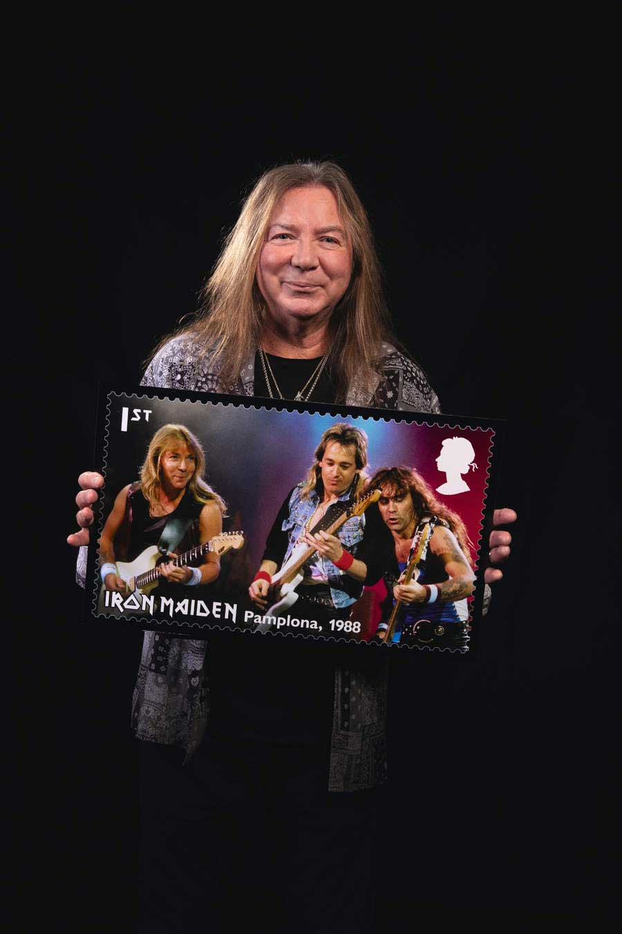Dave Murray holding a stamp mockup