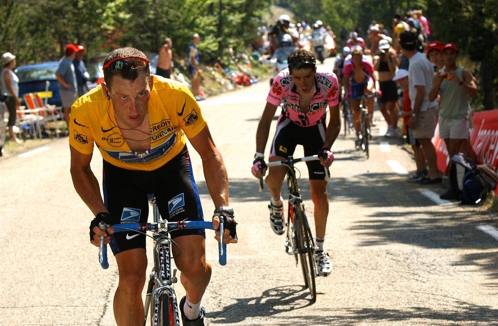 Lance Armstong riding away from Joseba Beloki during the 2002 Tour de France