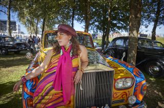 A psychedelic Roller? Just one of the thousands of classic car enthusiasts in period dress. Credit: Kiran Ridley/Getty Images