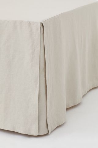 corner view of a linen bedsheet 