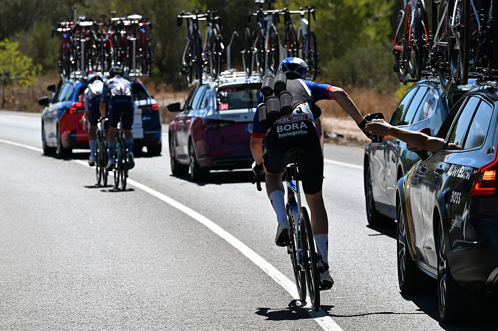 XERACO, SPAIN - AUGUST 29: Callum Thornley of Great Britain and Team Red Bull - BORA - hansgrohe carries bottles during the La Vuelta - 81st Tour of Spain 2026, Stage 8 a 171km stage from Pucol to Xeraco / #UCIWT / on August 29, 2026 in Pucol, Spain. (Photo by Tim de Waele/Getty Images)