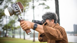 A photographer using a Hobolite Mini Max