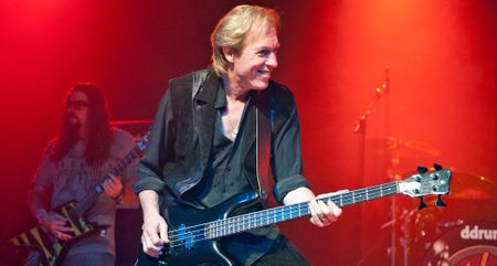 Francis Buchholz, how has died, aged 71, plays bass for Michael Schenker in 2012. 