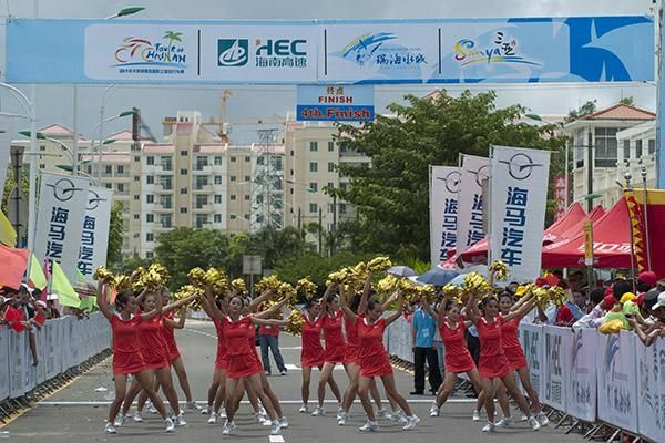 Dancing girls perform in Wenchang at the finish to stage four of the tour.