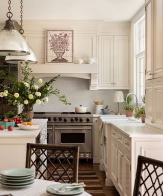 A white kitchen with a mix of finishes that add character