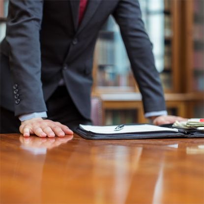 Outerwear, Coat, Collar, Blazer, Suit trousers, Office supplies, Office equipment, Portable communications device, Varnish, Cuff, 