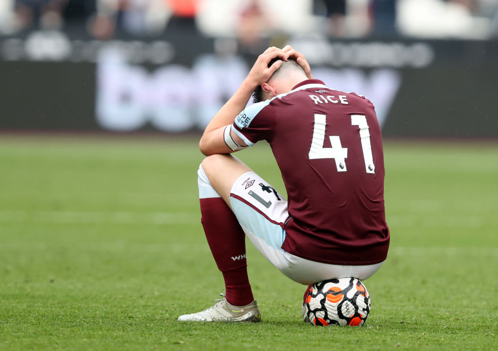 Declan Rice of West Ham United looks dejected following their side's defeat in the Premier League match between West Ham United and Manchester United at London Stadium on September 19, 2021 in London, England.