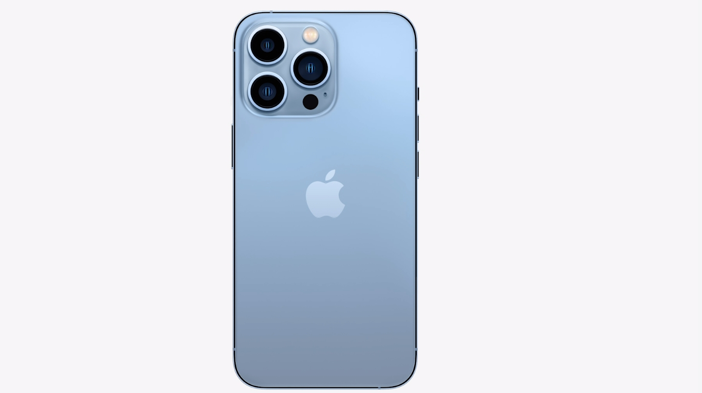 an iPhone 13 Pro on a grey background