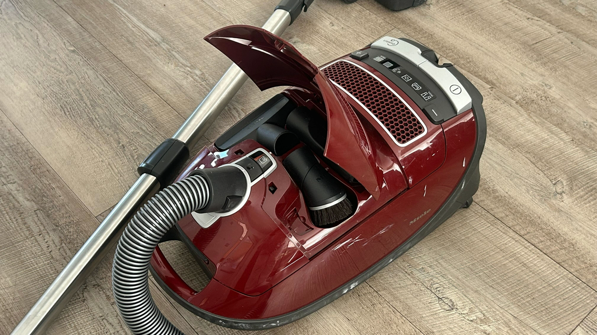 The Miele Complete C3 Cat &amp; Dog PowerLine with the compartment open